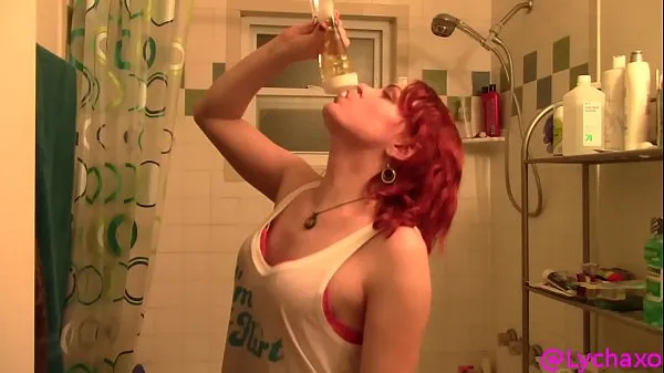 Big Trans girl chugging a bottle of pee power Movies